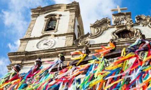 Salvador, Brazil – May 09, 2022: The Facade of Senhor do Bonfim church against blue sky in Salvador, Bahia